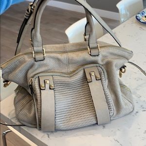 She + lo women’s handbag